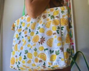 Bolso de tela impermeable con cierre. Limones sobre fondo blanco. Mirador Art Studio