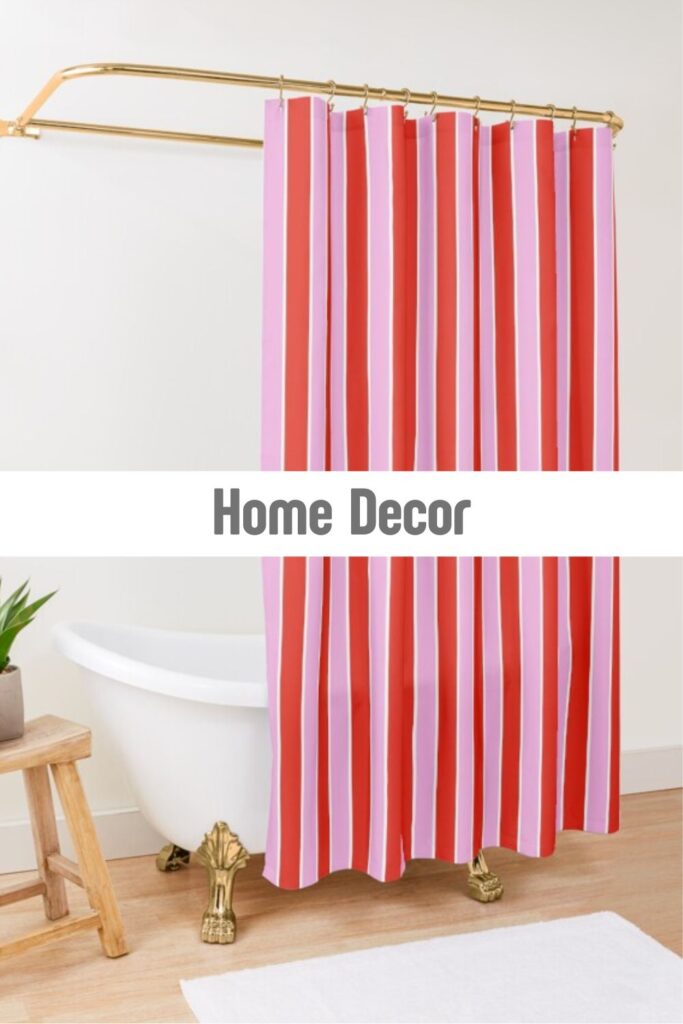 Pink and red striped shower curtain in a bright bathroom, modern home decor and interior design accents on Redbubble by Mirador Art Studio.
